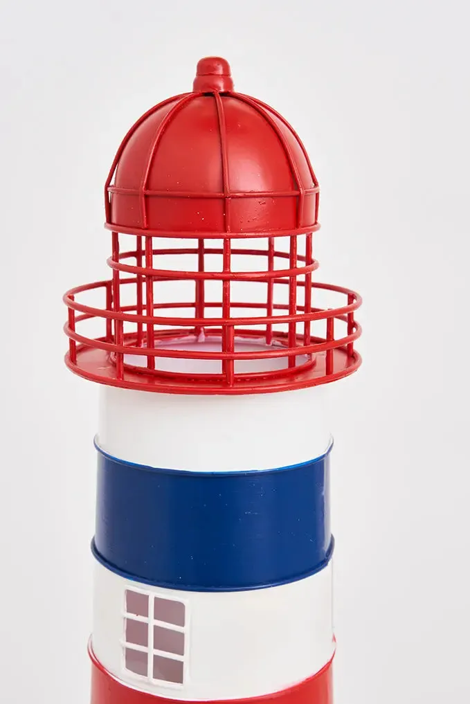 Faro de metal grande con casa
