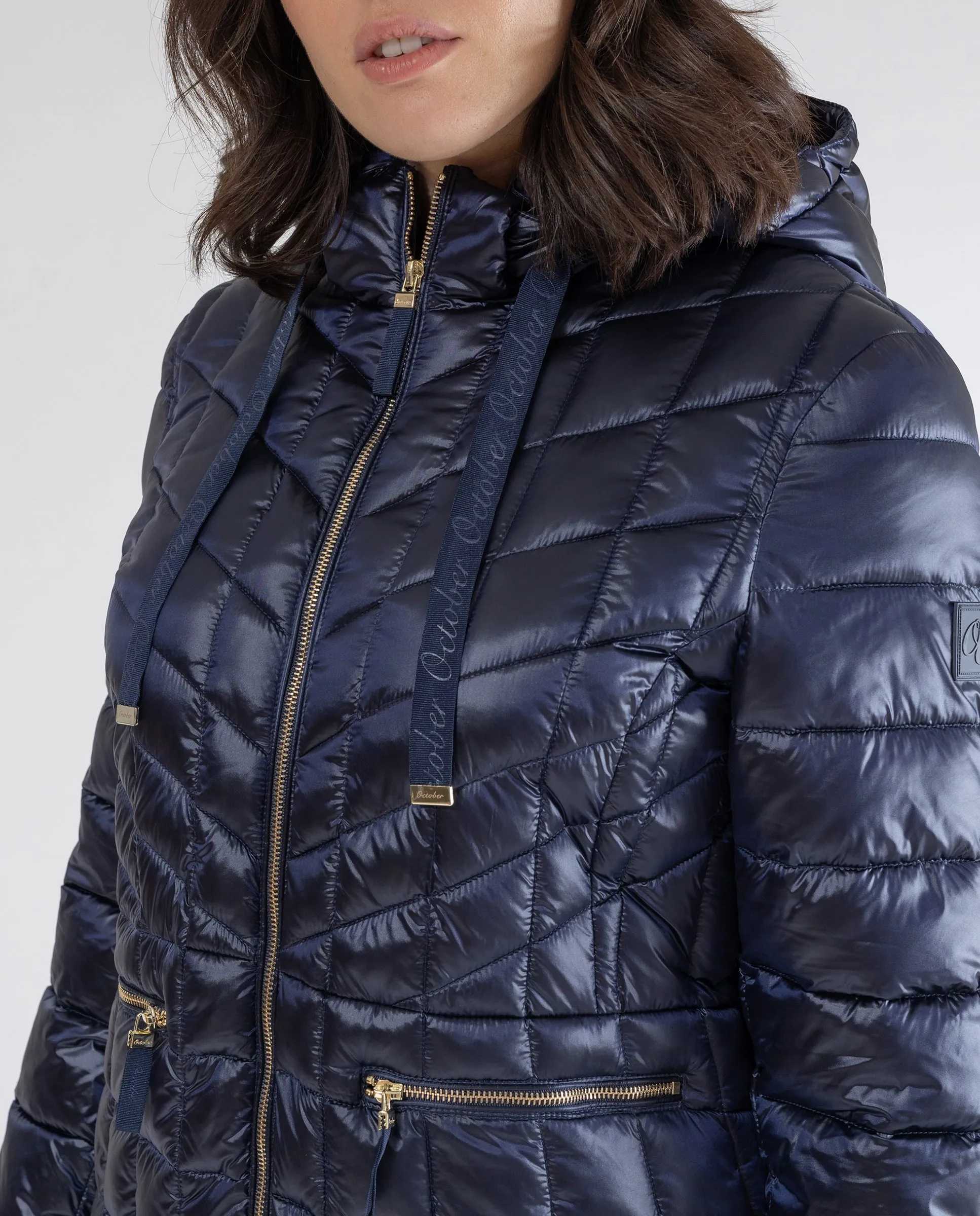 PARKA ENTALLADA LARGA CON CAPUCHA AZUL OSCURO